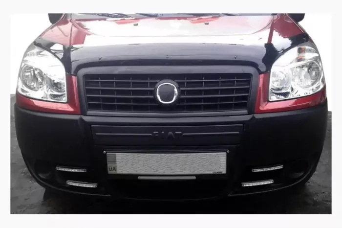 Середня зимова накладка на решітку Fiat Doblo II 2005↗ мм.